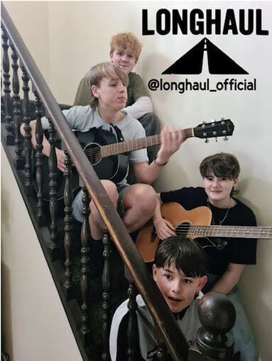 Band performing on a set of stairs