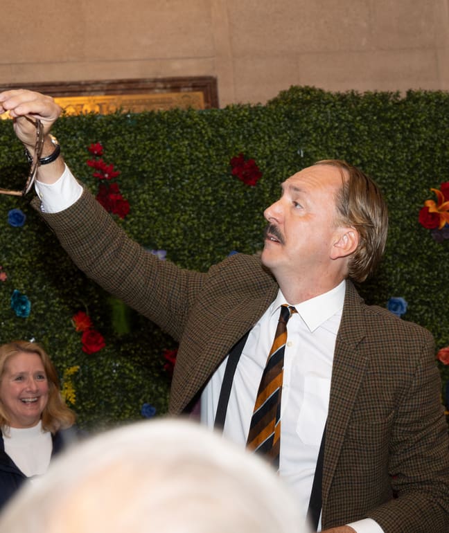 Actor performing within the comedy dining show