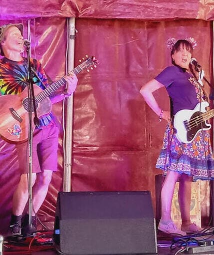 Two musical performers on stage